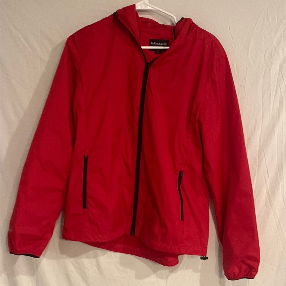 Rokka & Rolla red windbreaker/ rain jacket, size Large. Has 2 zip up pockets.